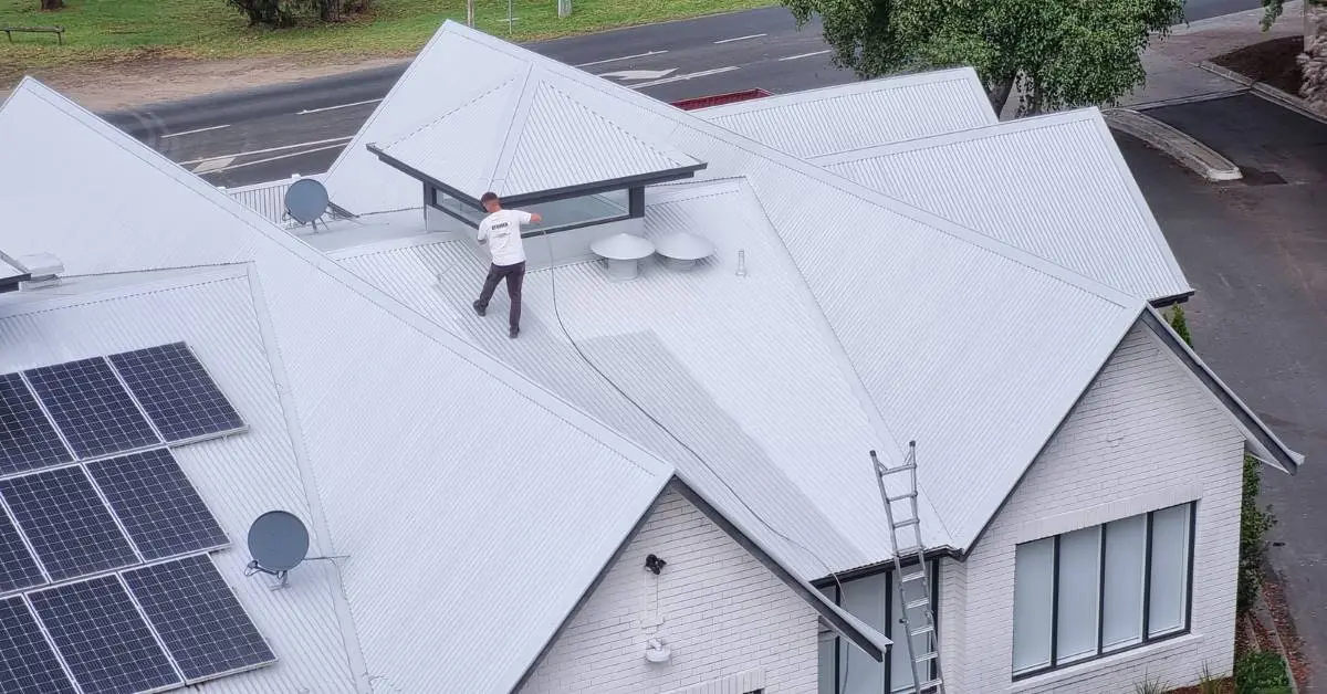 Metal roof painting and restoration — full recoat — Roof Restoration Services Northern Suburbs Melbourne